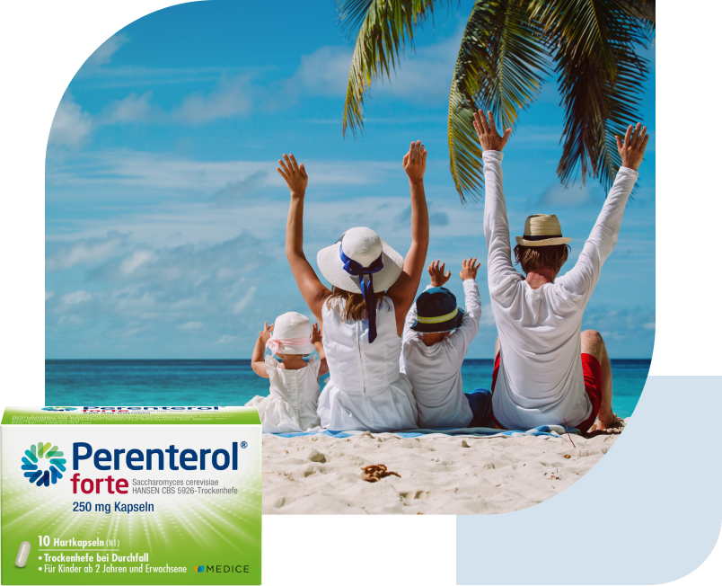 Eine Perenterol forte Verpackung, mit einer Familie, die am Strand sitzt im Hintergrund