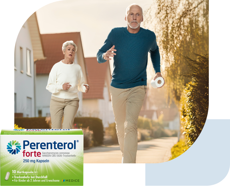 Eine Perenterol forte Verpackung, mit zwei rennenden Menschen, die Klopapier halten im Hintergrund